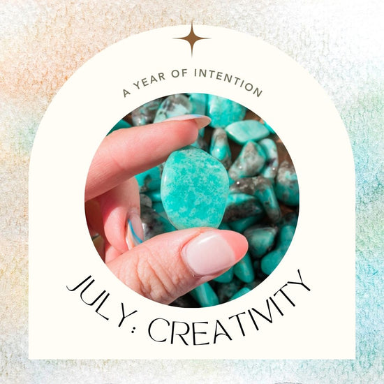 image reads "a year of intention. July: creativity" and a photo of blue amazonite crystal