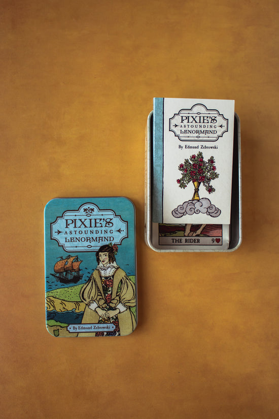 Pixie's Astounding Lenormand cards. This deck features artwork reminiscent of traditional Tarot archetypes, but in a simpler fashion. Housed in an adorable petite tin.